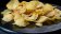 potato-chips-on-black-background-260nw-1924511618